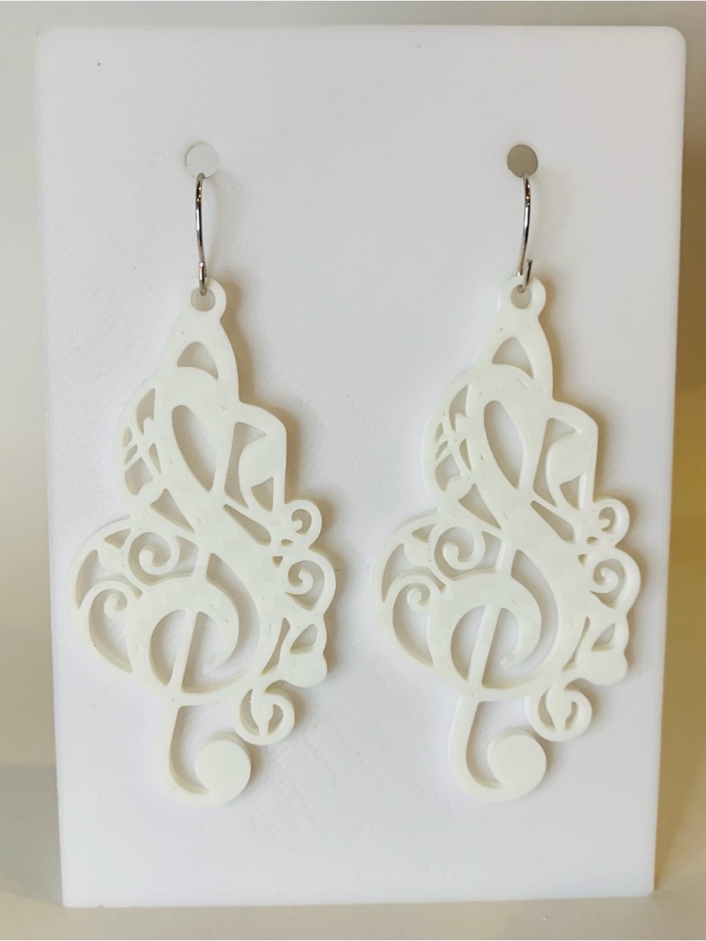 White Filigree Music Note Drop Earrings